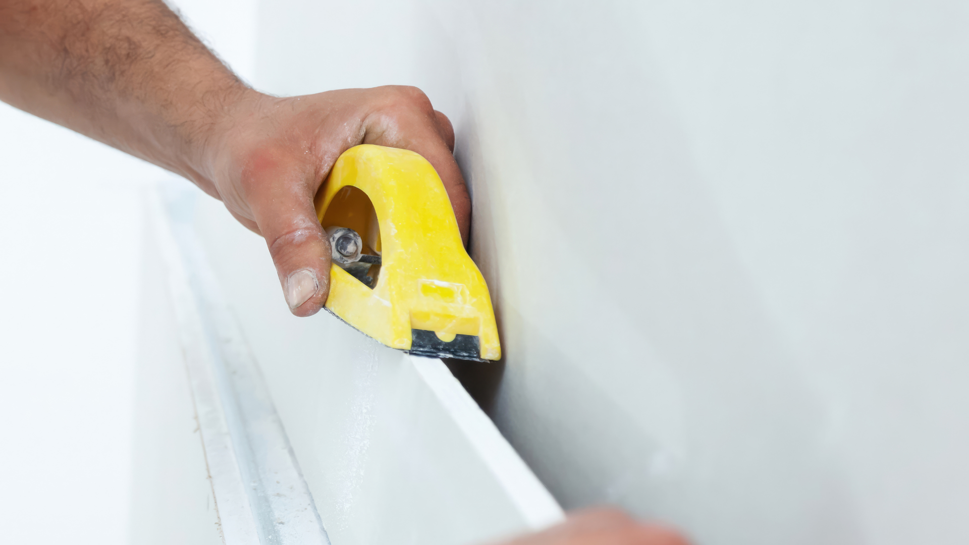painting contractor preparing cabinets for refinishing
