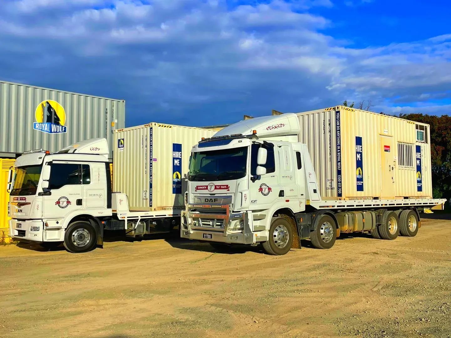 Trucks Transporting Shipping Containers Outdoors In NSW