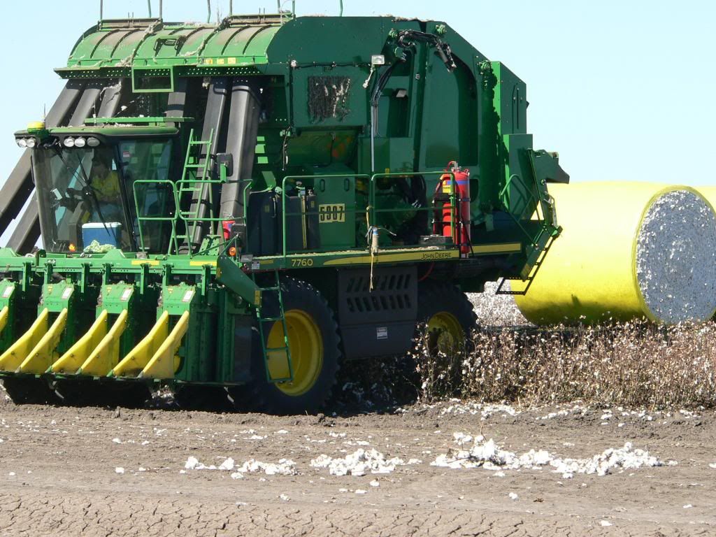 John deere 7760 with bale trailer 
