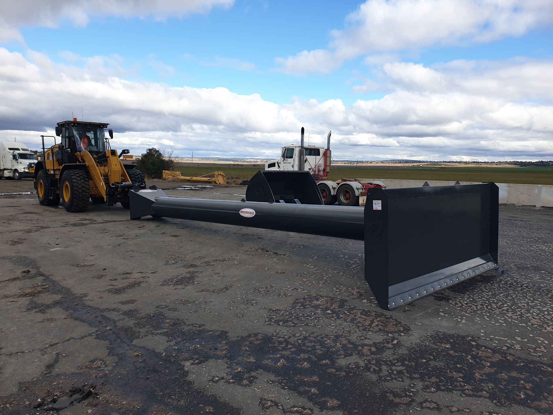 Industrial grain pusher