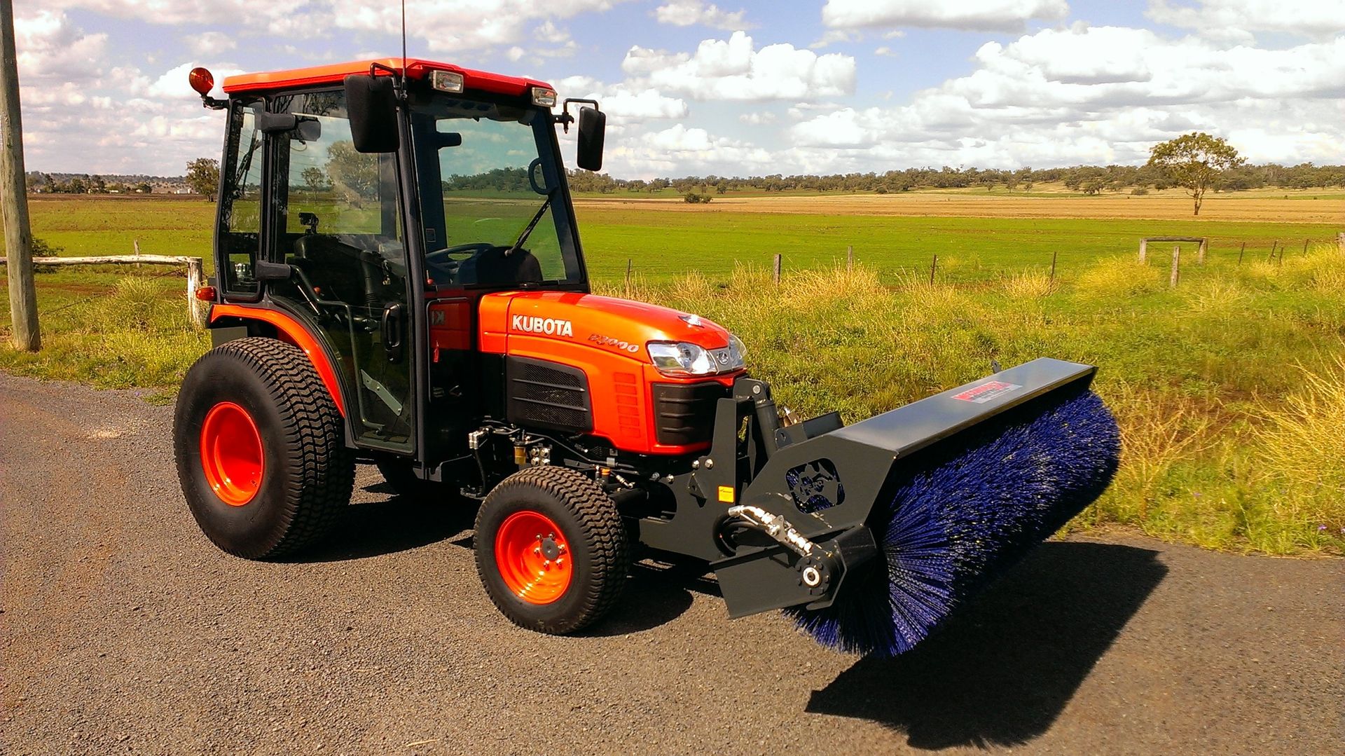 Broom on Kubota tractor