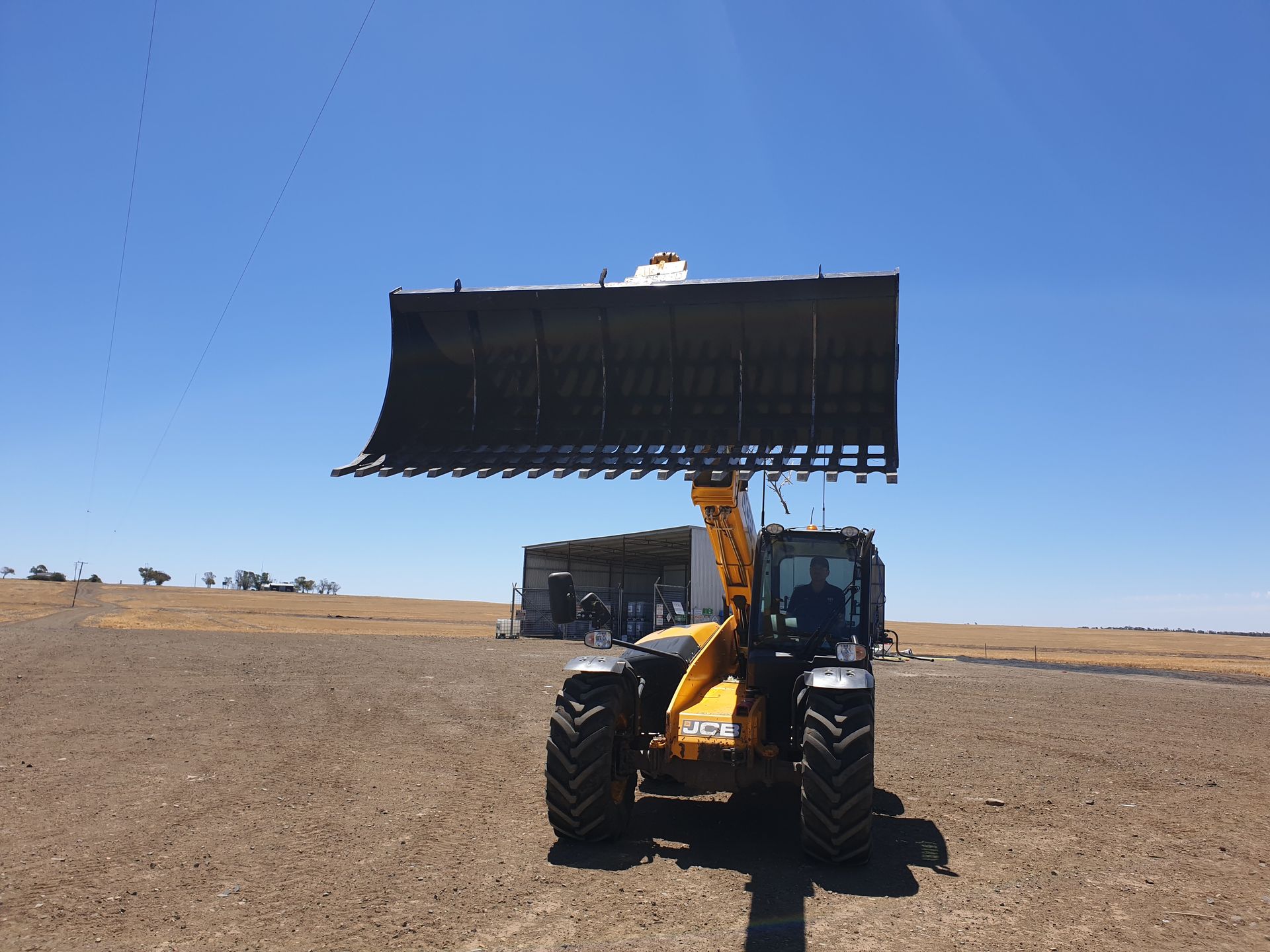 Telehandler stone fork bucket