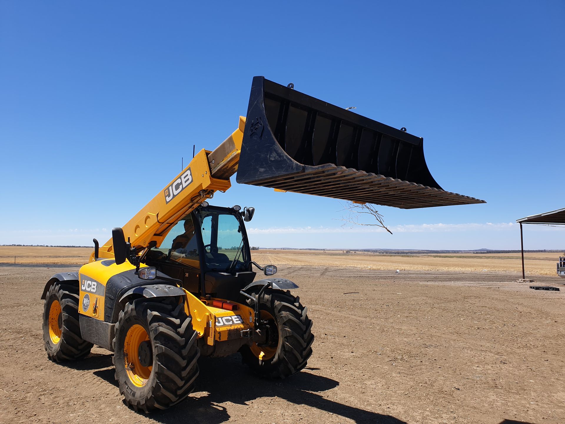 Telehandler stone fork bucket