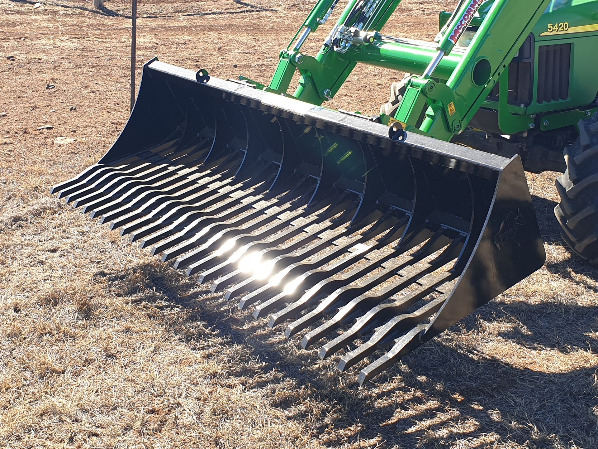 John Deere tractor stone fork bucket