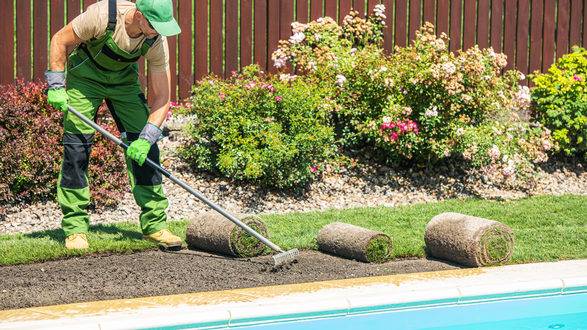 residential yard drainage contractor inspecting wet lawn
