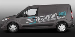 A black van with the word patchwork pro on the side.
