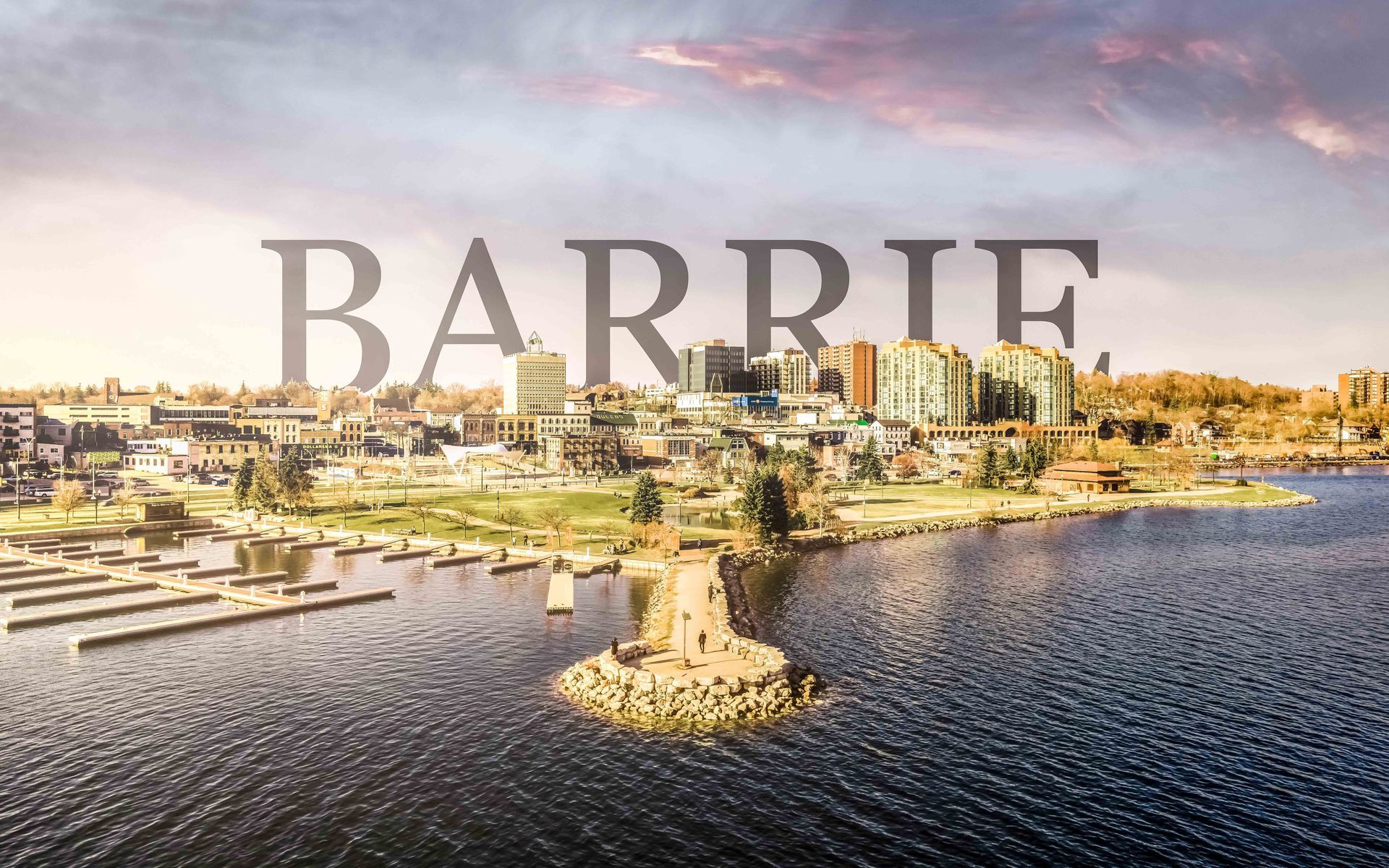 Drone photo, Barrie word behind the skyline in background, lake in the foreground