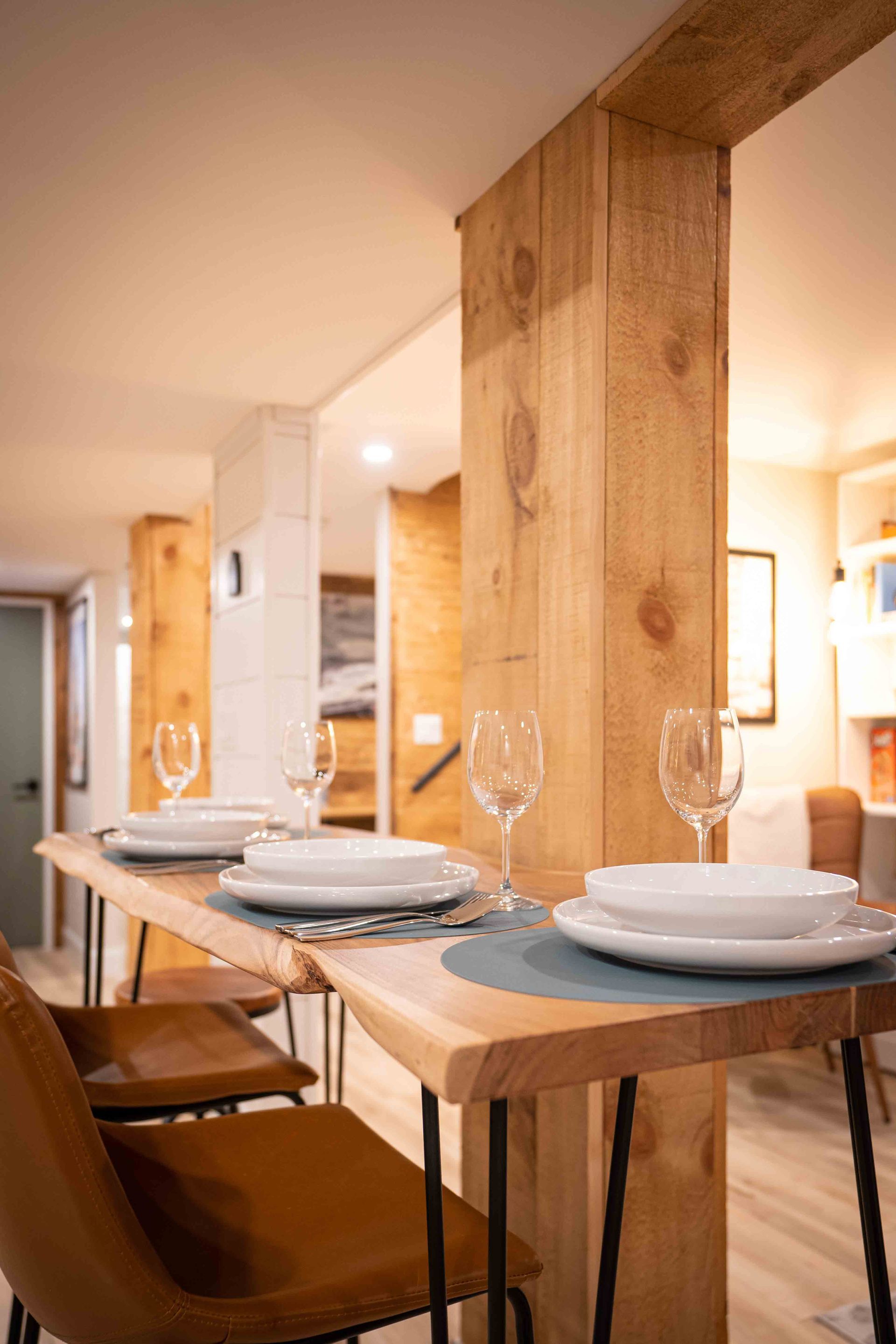 wooden pillars with brown dining table
