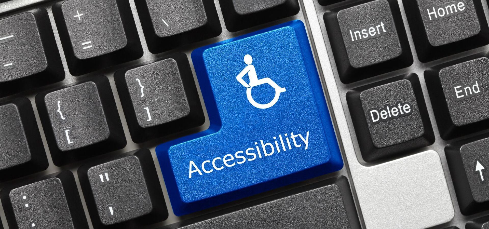 A blue key on a keyboard that says accessibility
