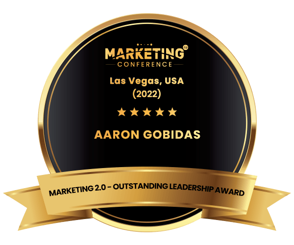 A gold badge that says marketing conference las vegas usa