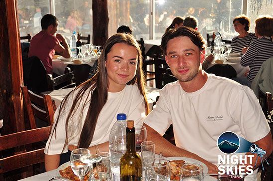Couple enjoying dinner during their Night Skies Tenerife tour