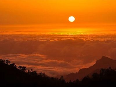 Image showing person enjoying Tenerife sunset above the sea of clouds