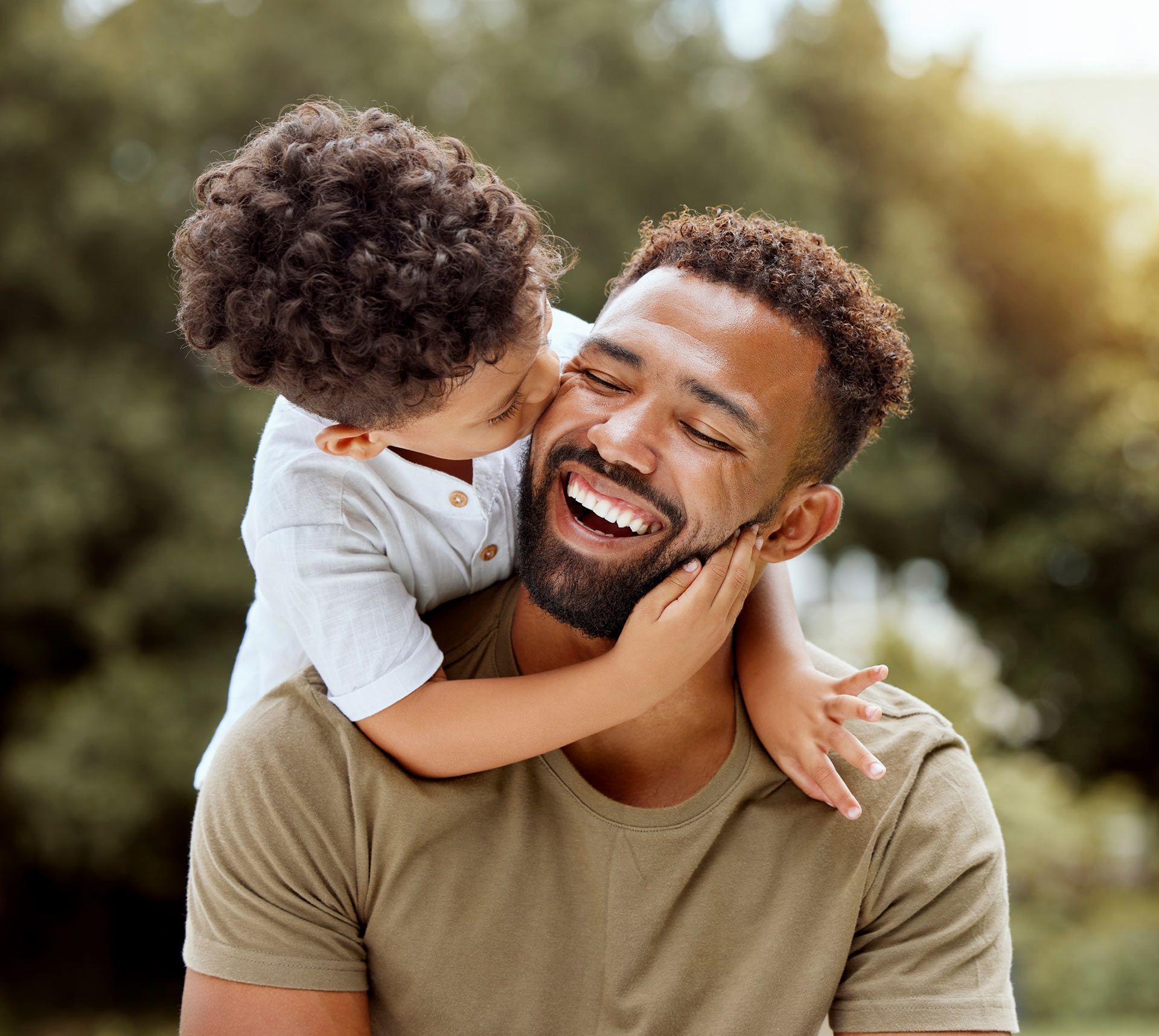 A boy kissing and hugging his father
— Frisco, TX — Paternity Testing Solutions