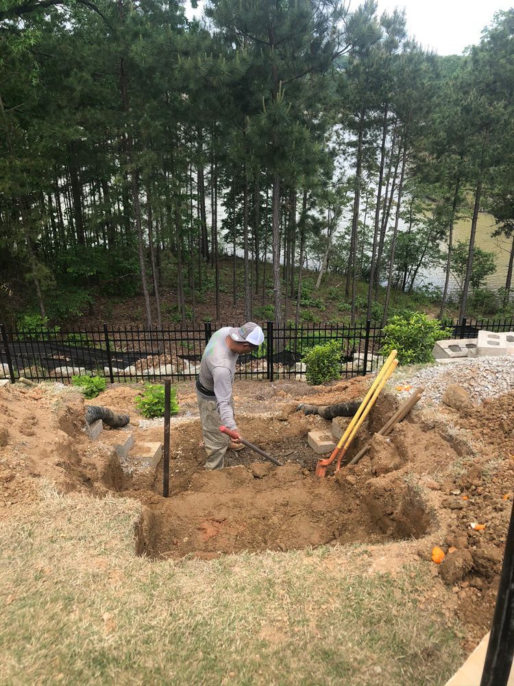 Man Working on Steps — Flowery Branch, GA — All About Irrigation & Landscape Services