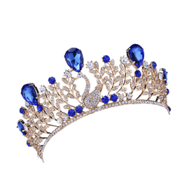 Gold crown with blue teardrop gems and a swan centerpiece.
