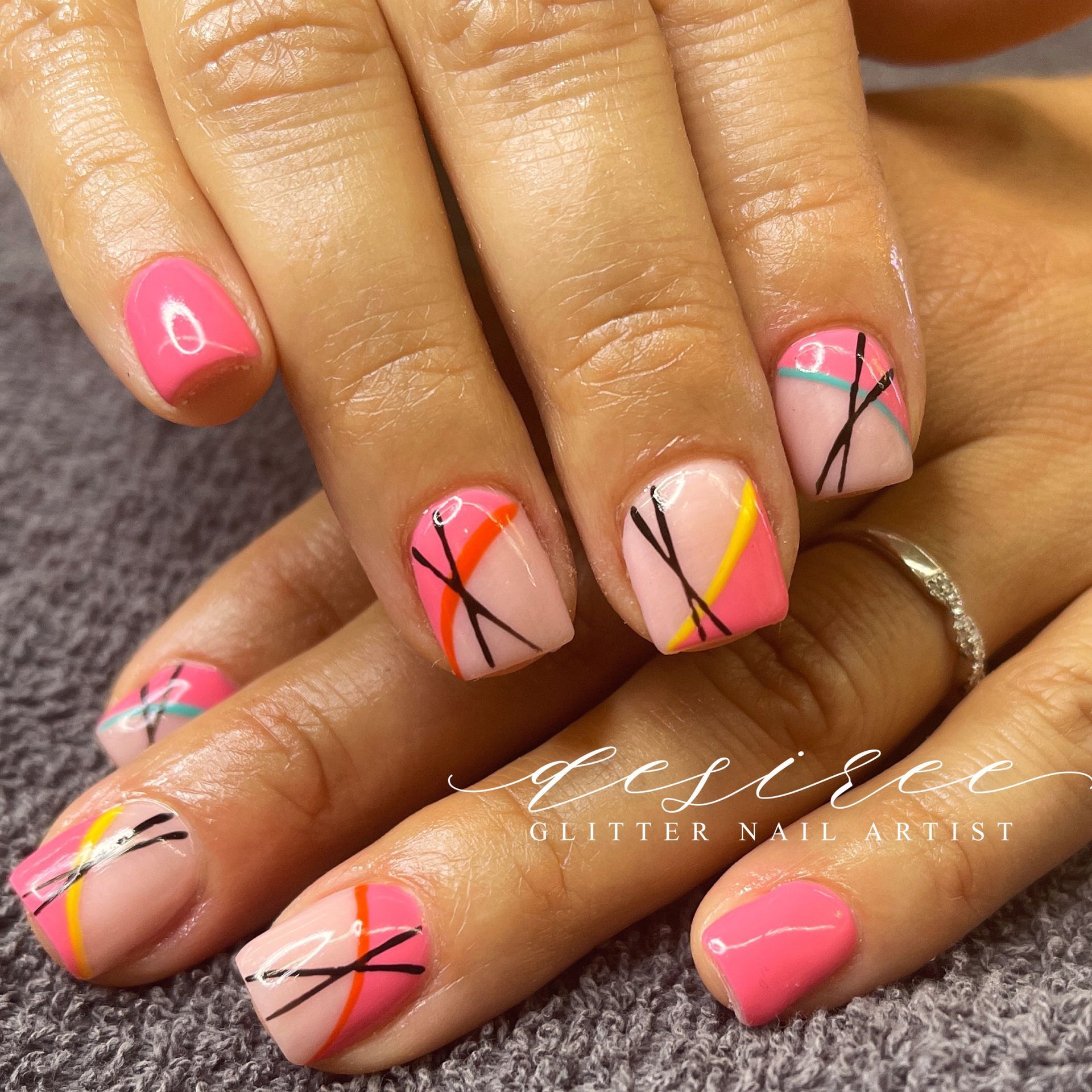 Colorful nail art design by Desert Canvas Studio LLC