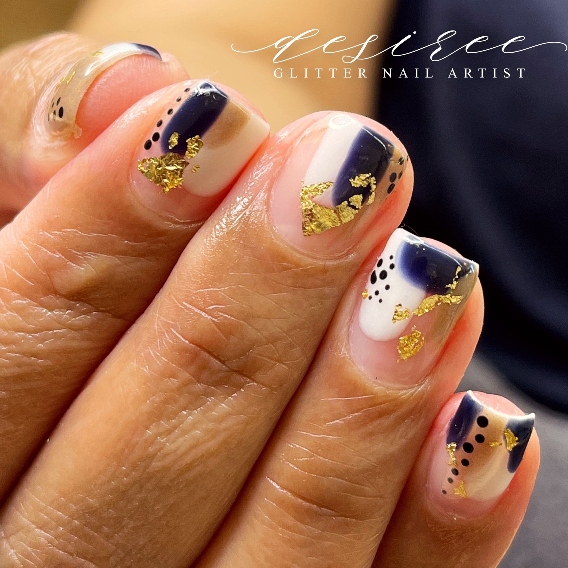 Custom manicure with intricate nail art design