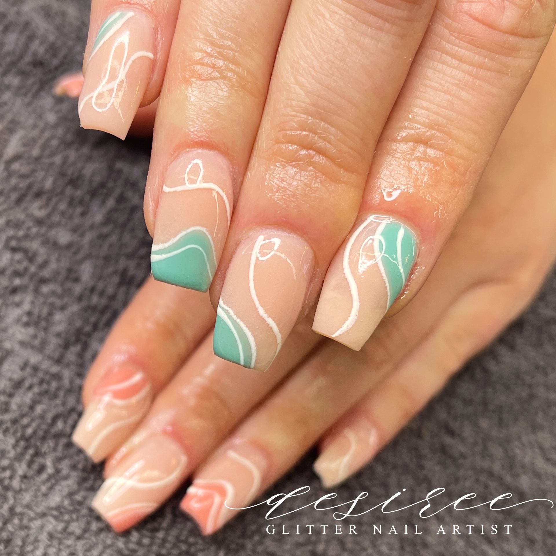 Nail enhancement with custom artistic design