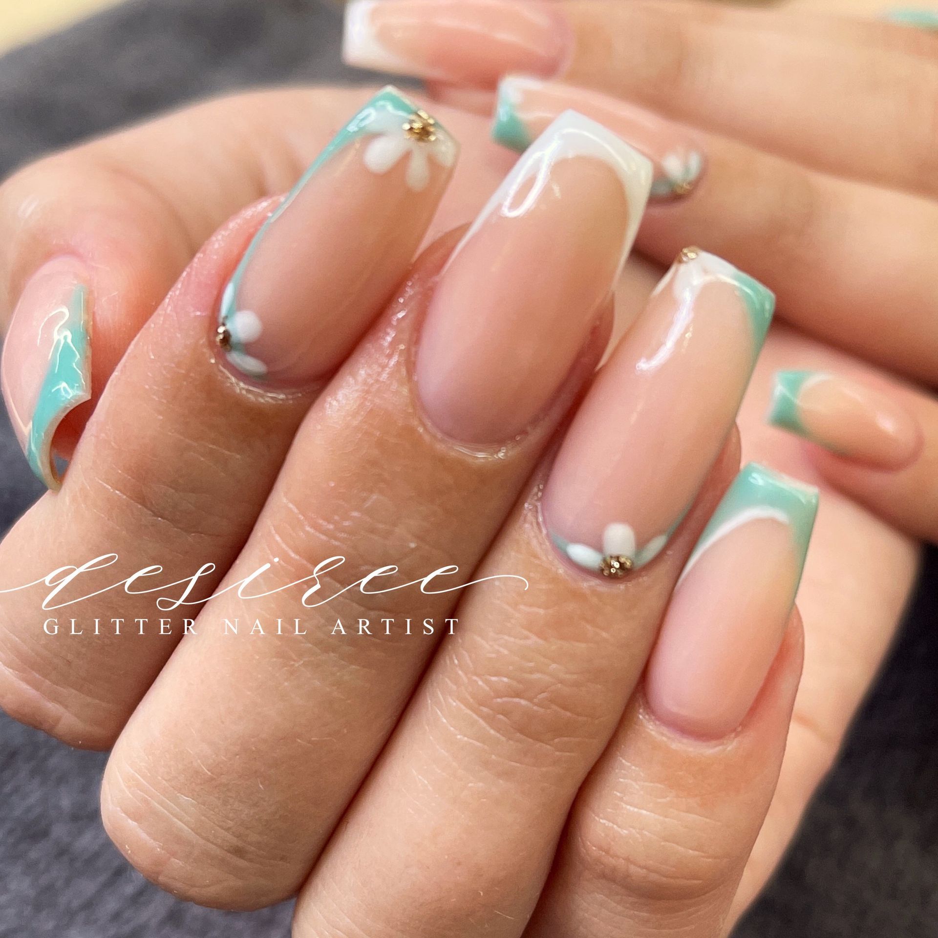 Custom manicure with intricate nail art design