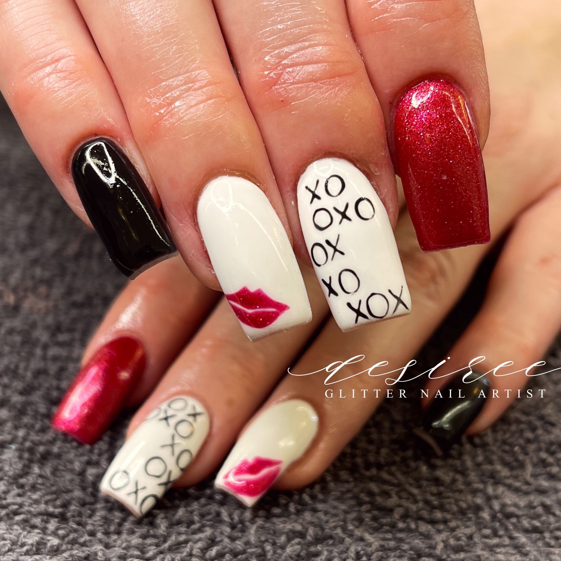 Hard gel nail enhancements with artistic design