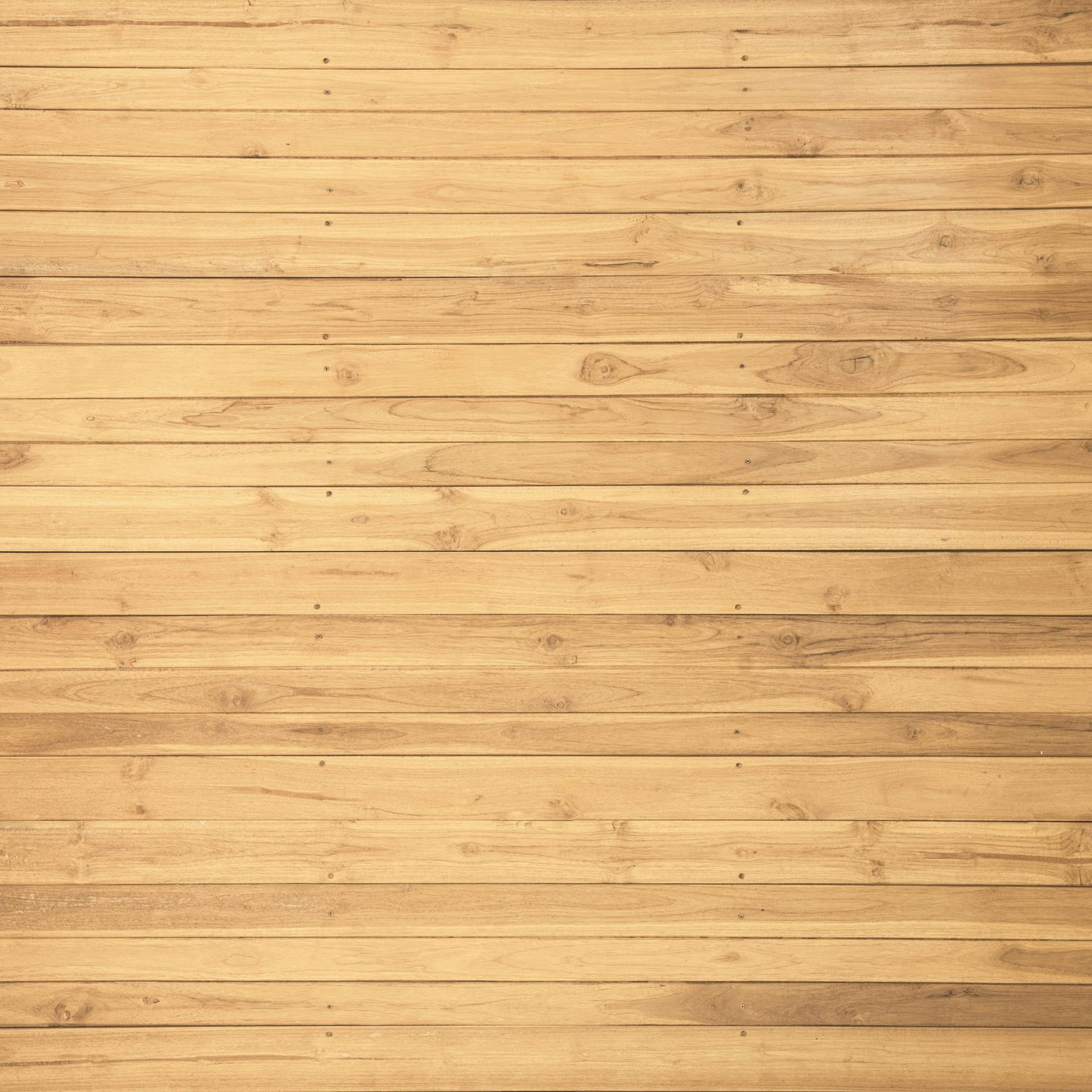 C'est un gros plan d'un plancher en bois.
