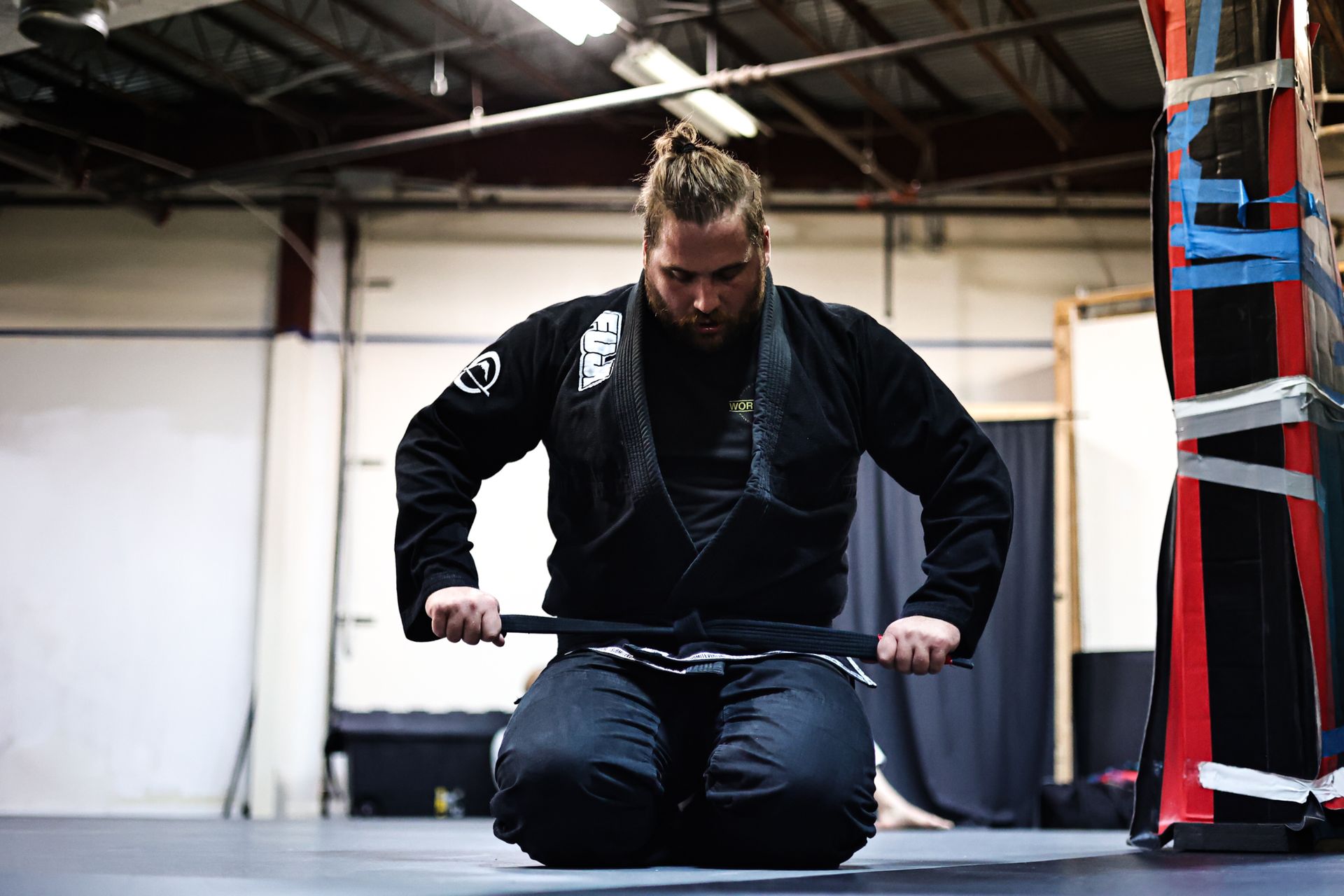 Adults training Jiu-Jitsu at Infinity Jiu-jitsu and Judo in Timonium, MD, building strength.
