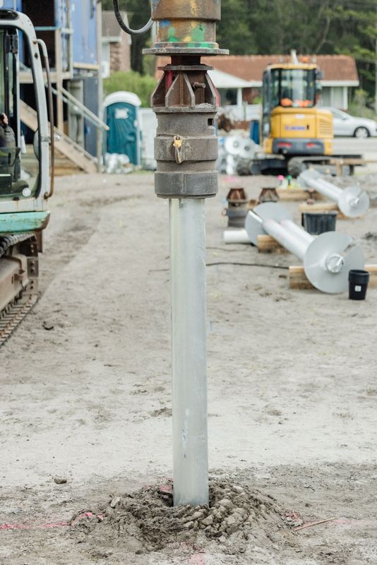 Machine Helical Piers use to install screw pilings and pierings.