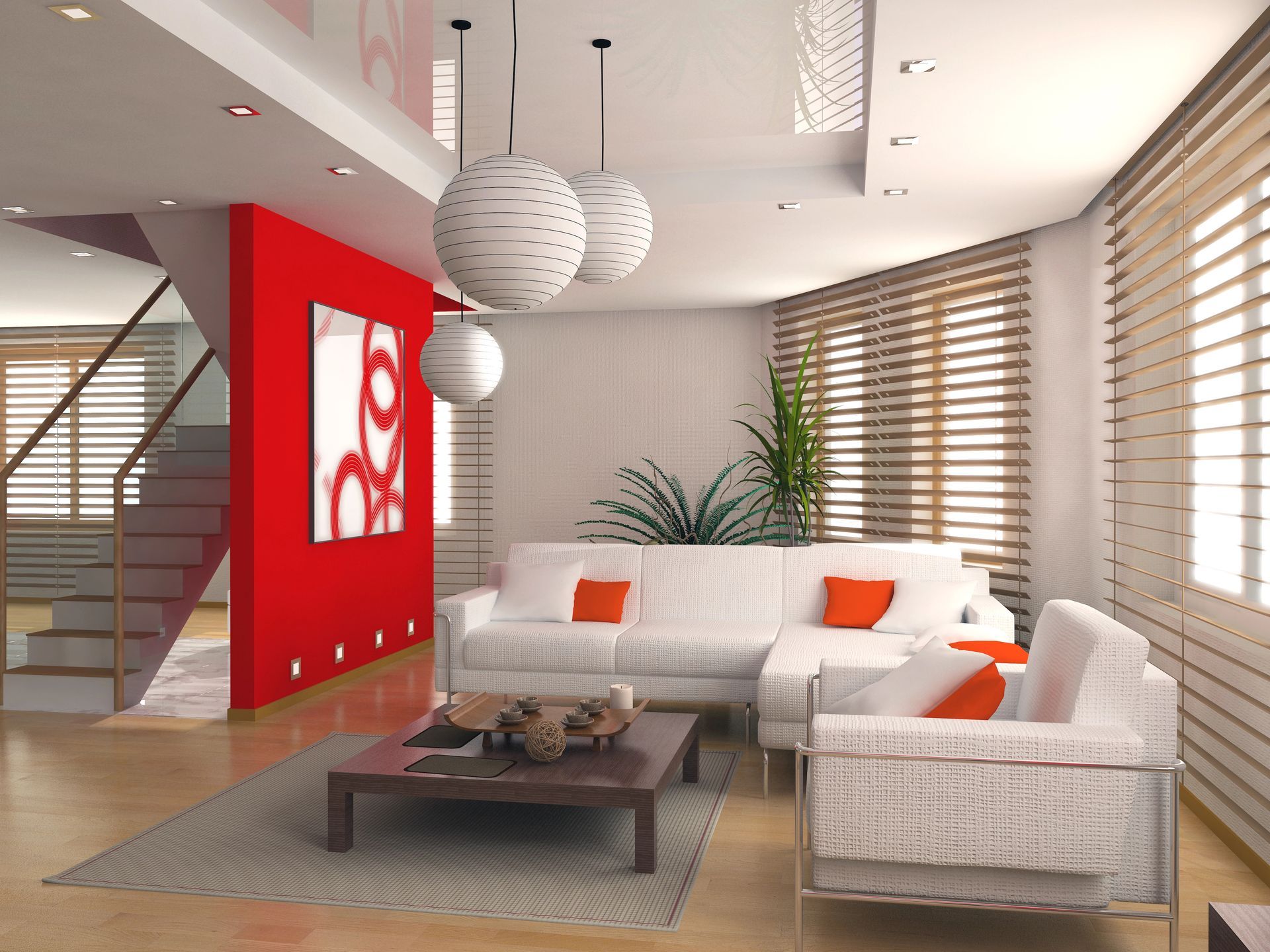 Modern living room with red accent wall, white furniture, globe lights, and wooden blinds in Monona, Wisconsin.