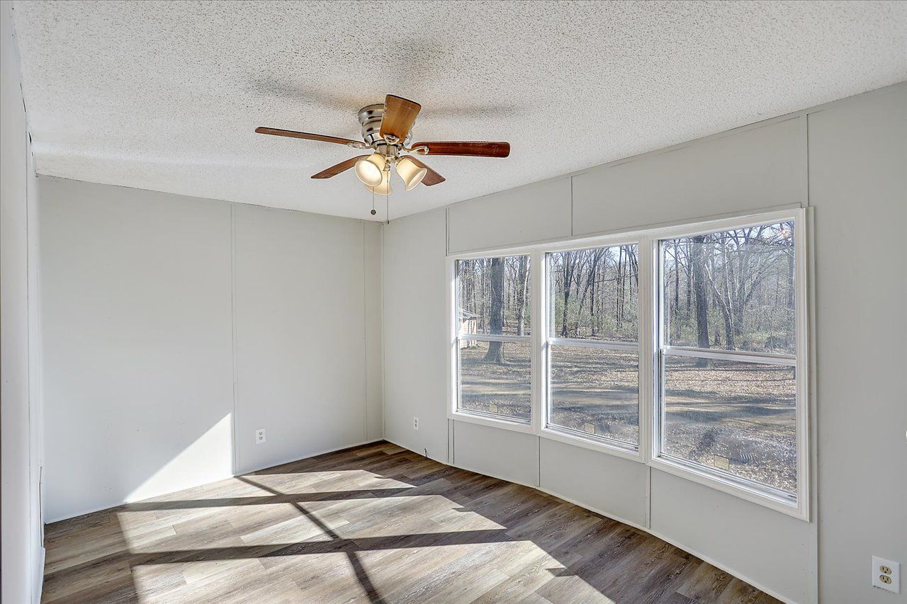 SMITH MOBILE HOME PARK - Bedroom with celling fan