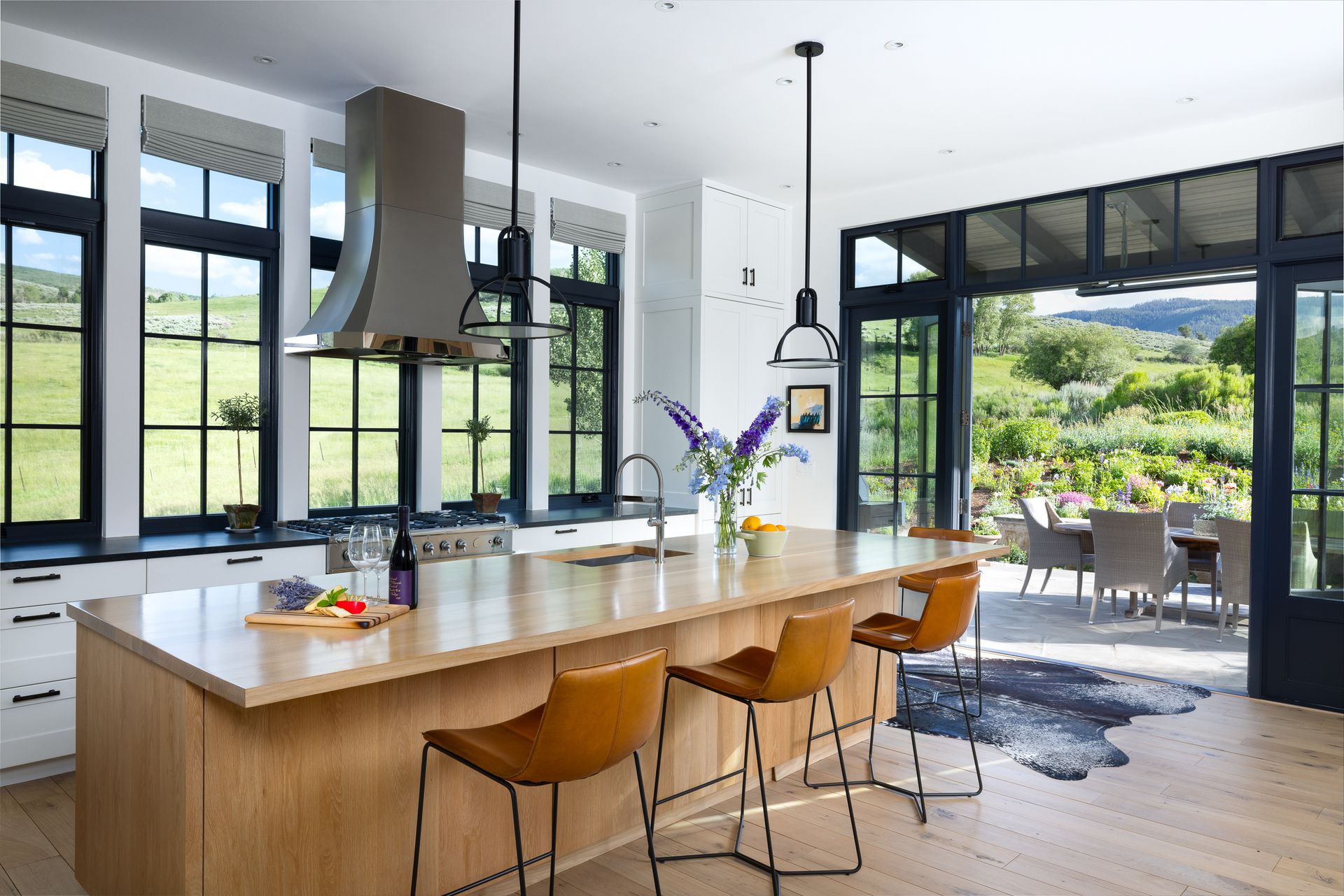 There is a large island in the middle of the kitchen.
