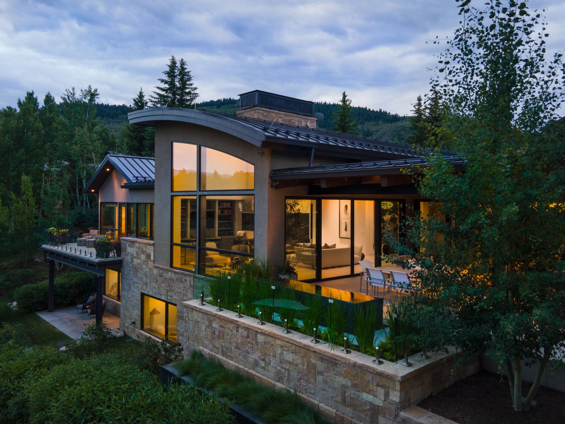 An aerial view of a house with a lot of windows