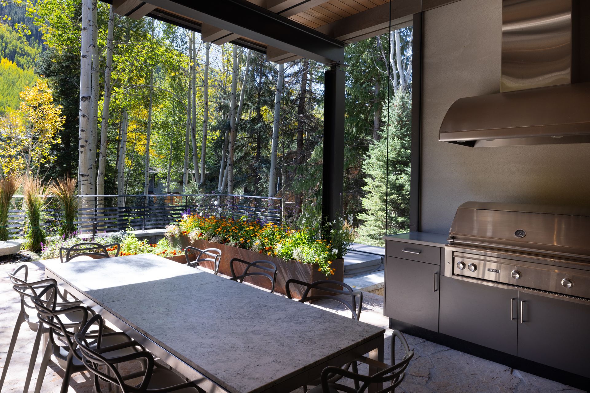 A large house with a hot tub in the backyard.