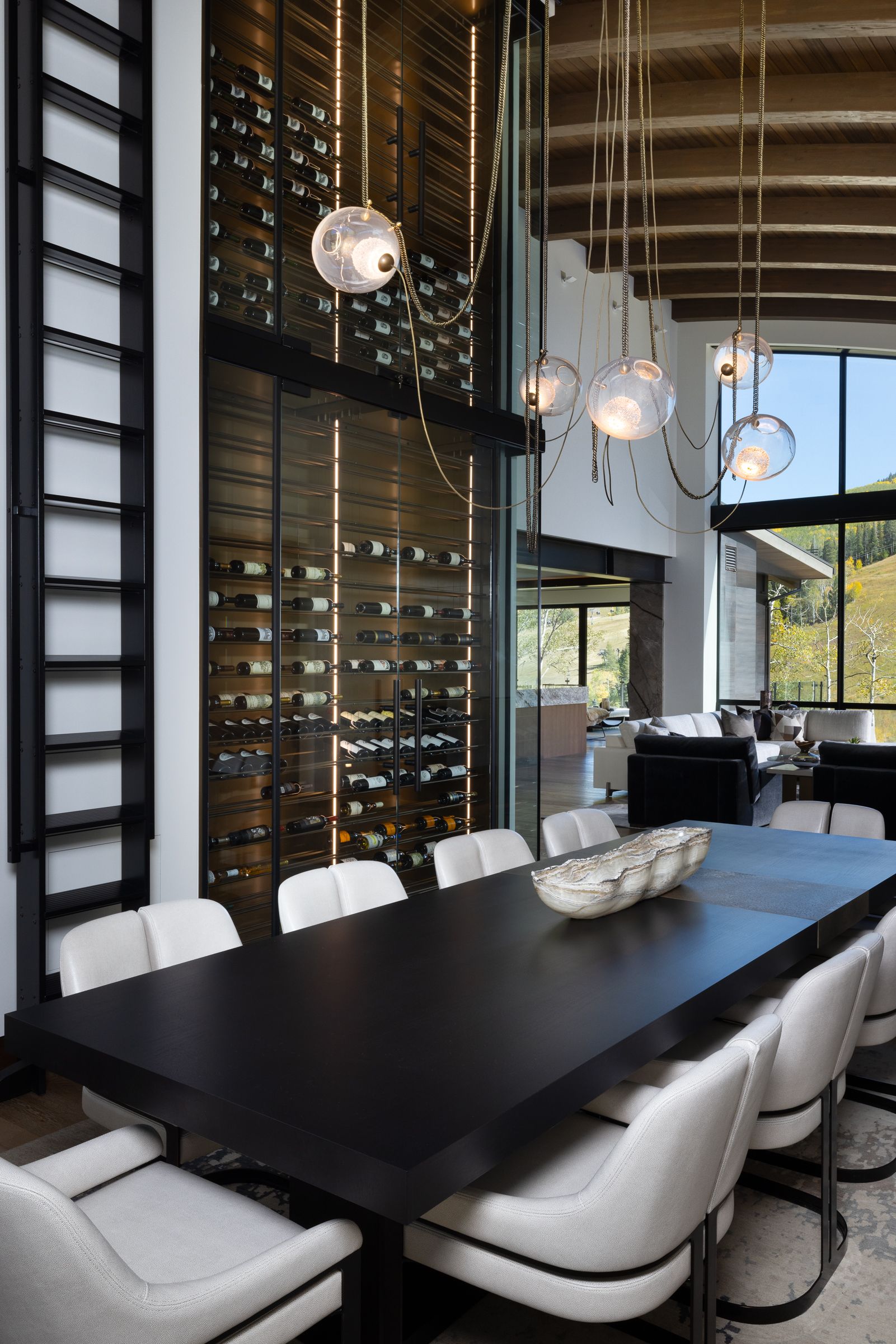 There is a large table and chairs in the dining room.