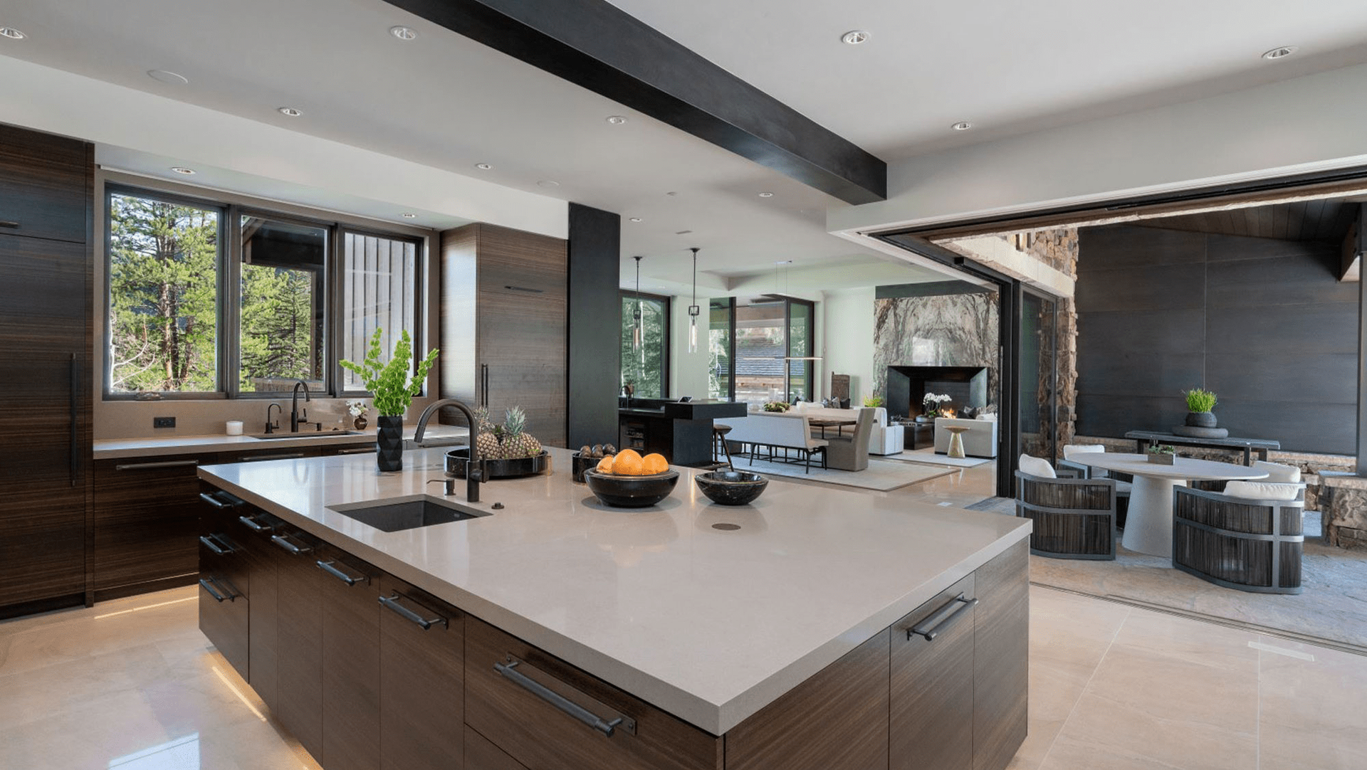 There is a large island in the middle of the kitchen.