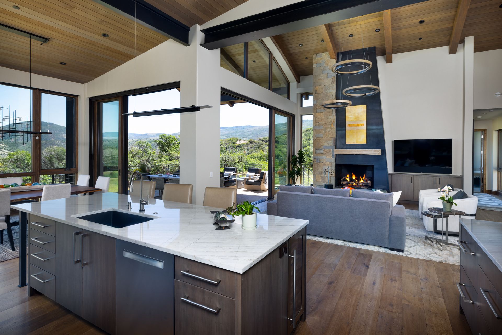 A kitchen with a large island in the middle of the room.