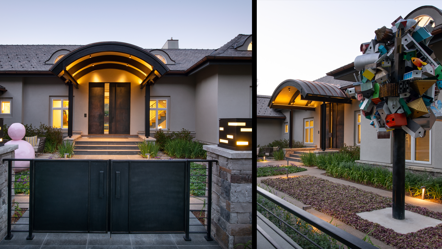 A house with a gate and a sculpture in front of it.