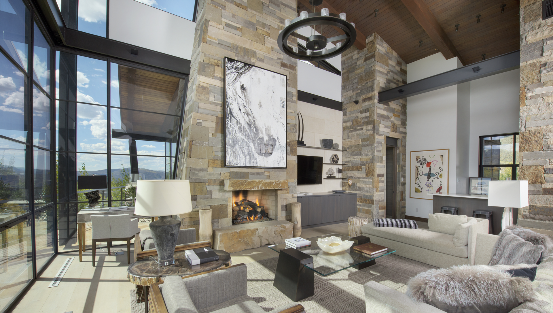 An artist 's impression of a living room with a fireplace and a couch.