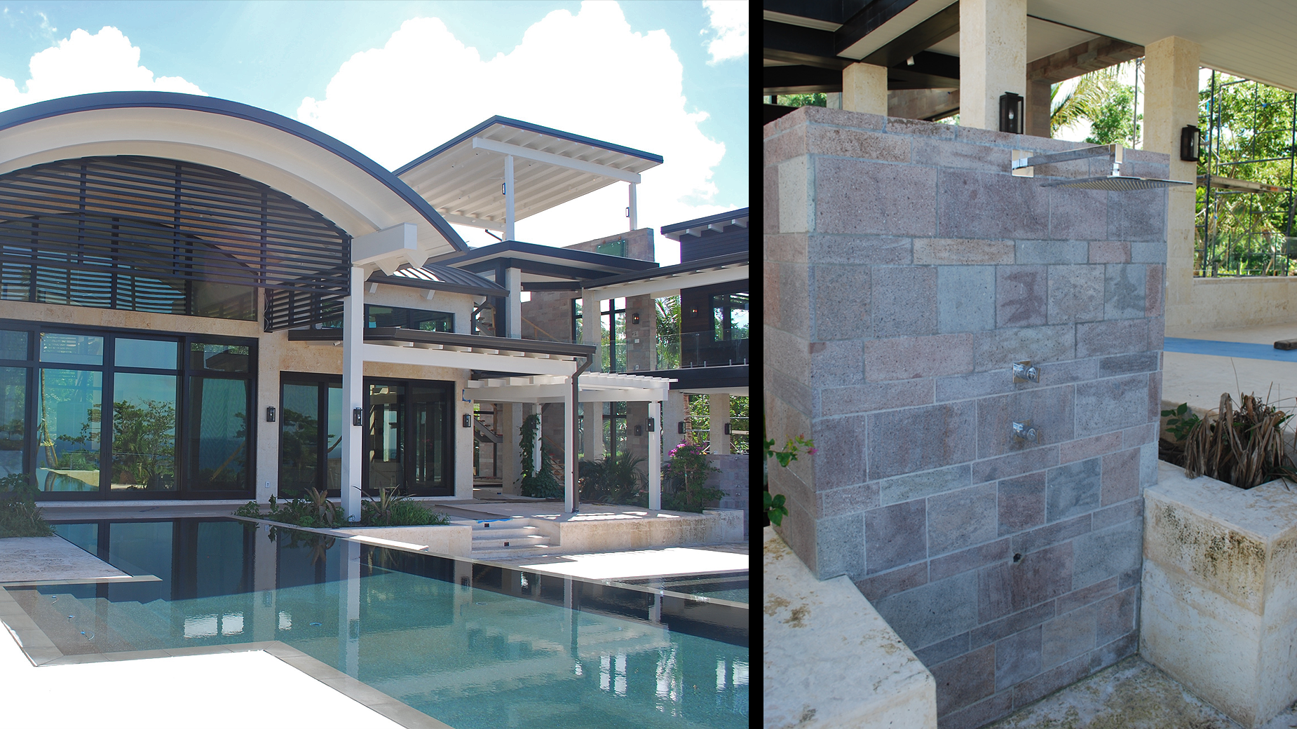 A large house with a swimming pool in front of it