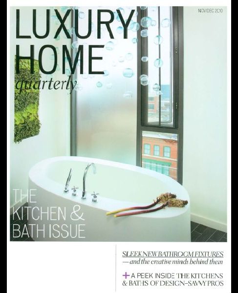 A luxury home quarterly magazine with a bathtub on the cover
