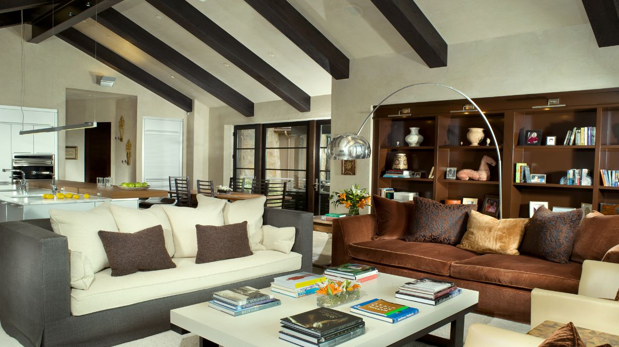 A living room with a couch and a coffee table