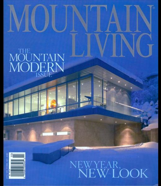 A mountain living magazine with a modern house on the cover
