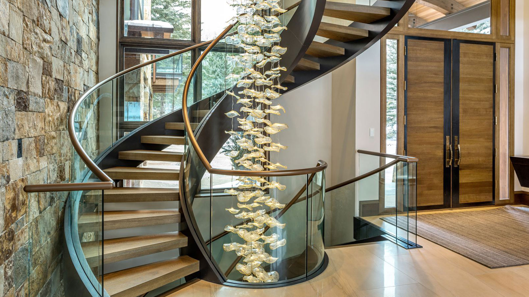 There is a spiral staircase in the middle of the room.