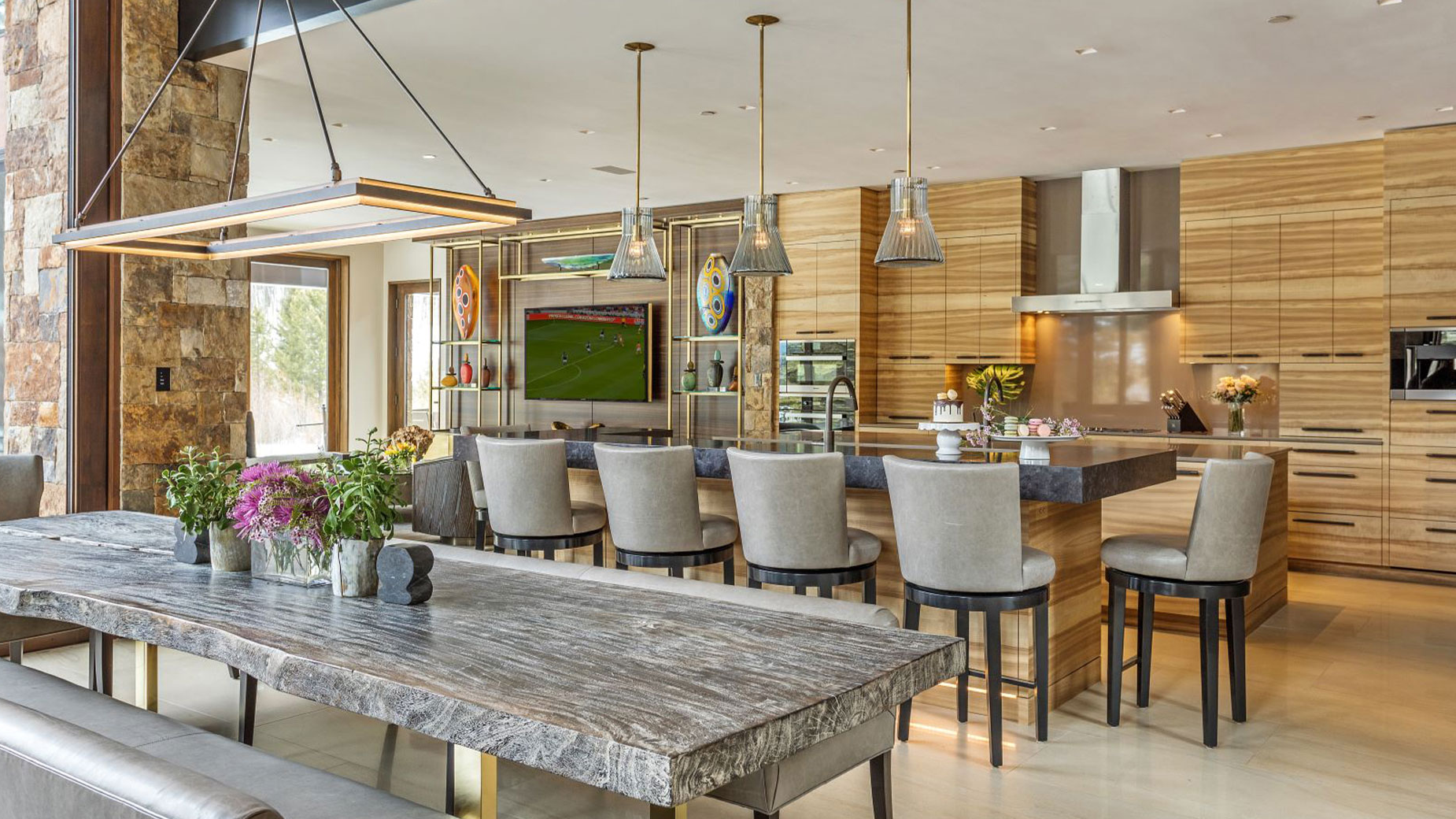 There is a large table in the middle of the room.