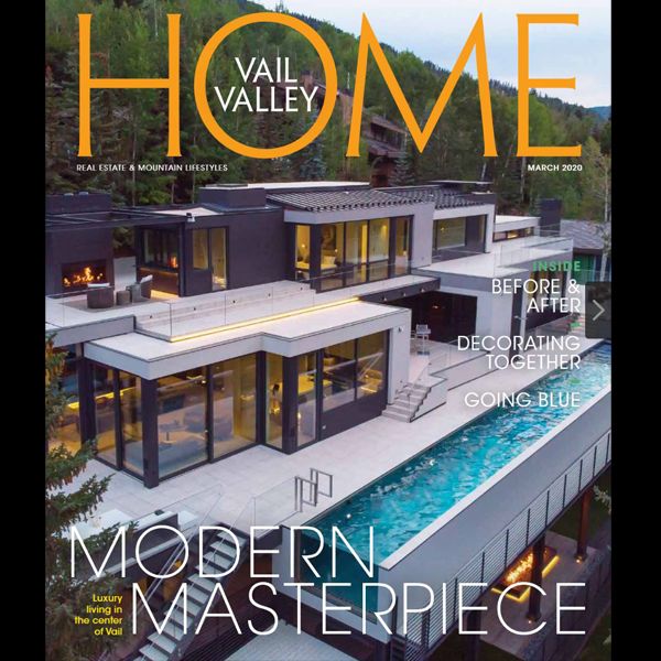 A modern house is on the cover of a home magazine