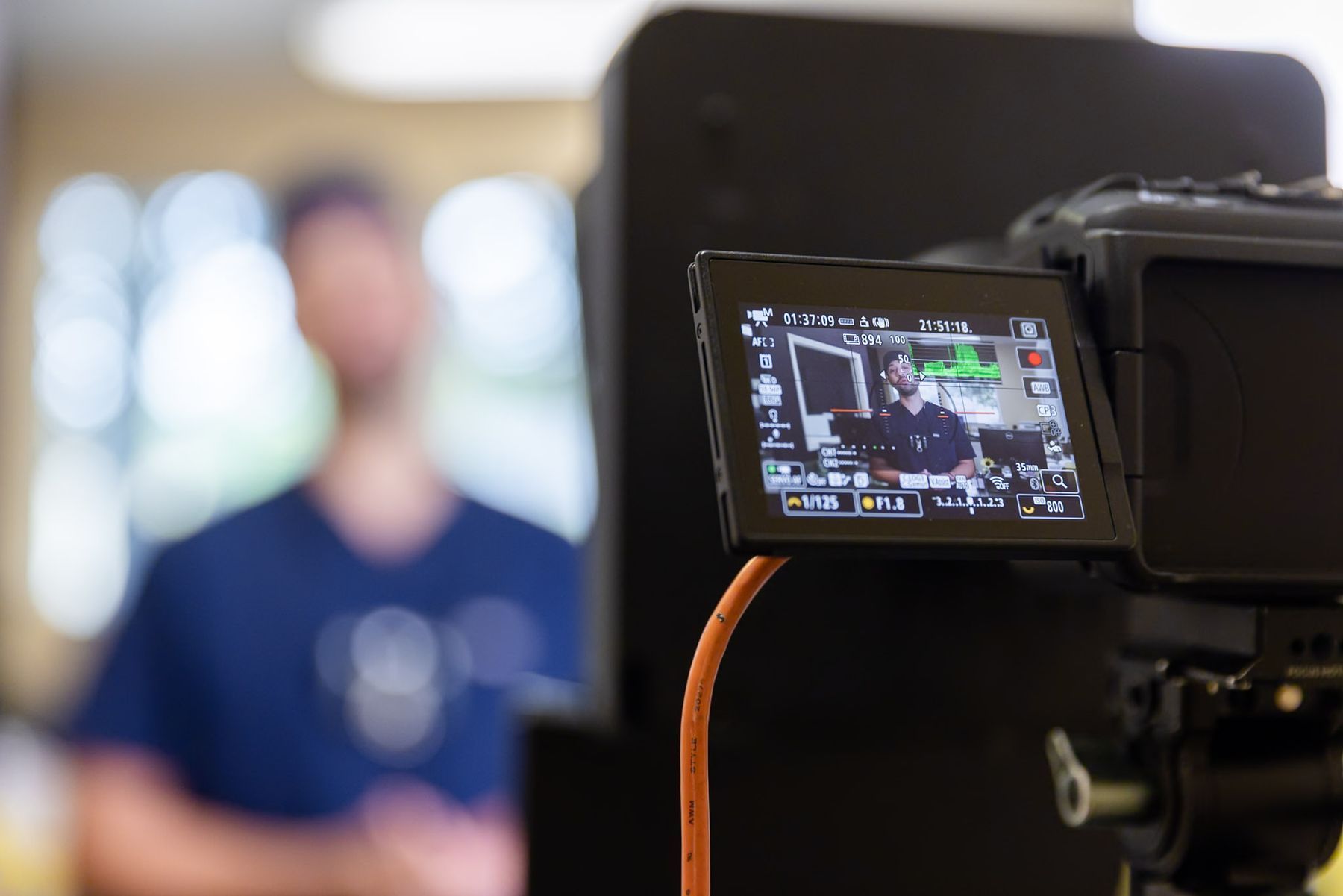 Camera monitor recording a dental team member