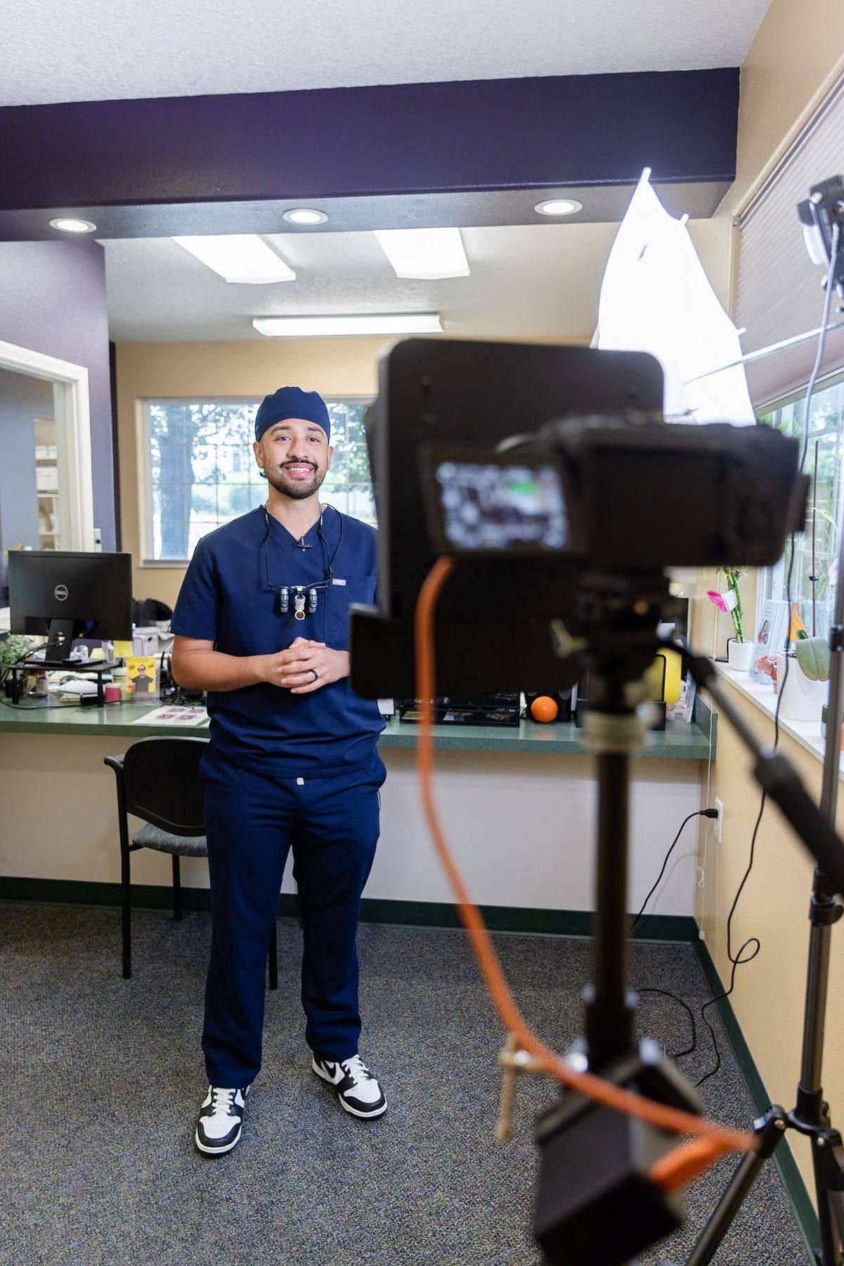 Dentist recording a video with Digital Floss at Cornelius Dental Clinic