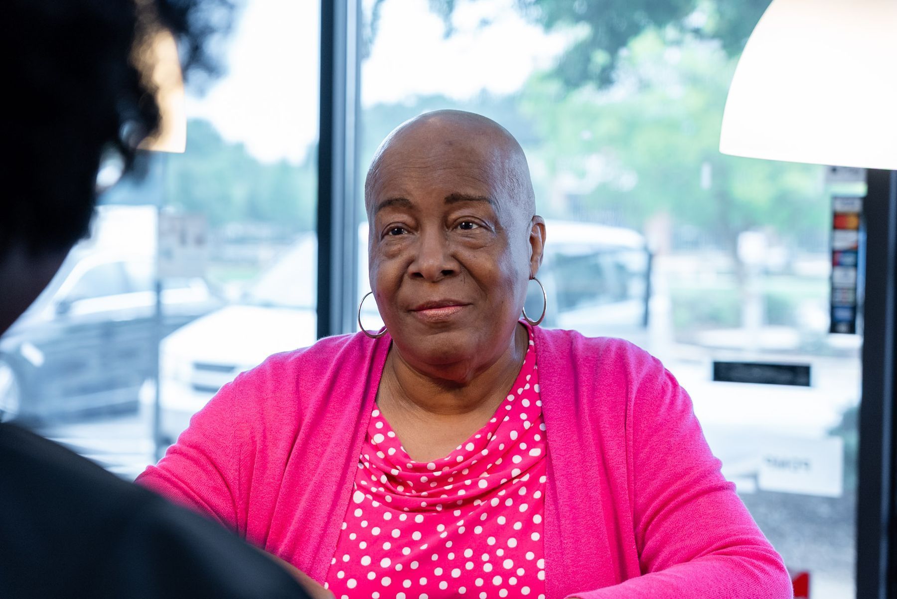 A patient listening during a visit, photographed by Digital Floss