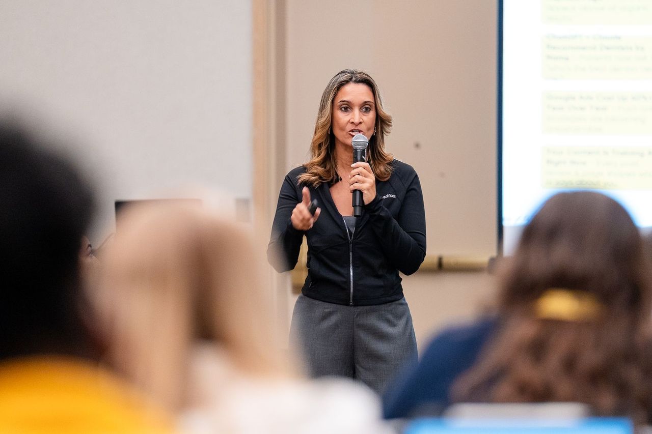 Dr. Anissa Broussard teaching a packed session at the Florida Dental Convention