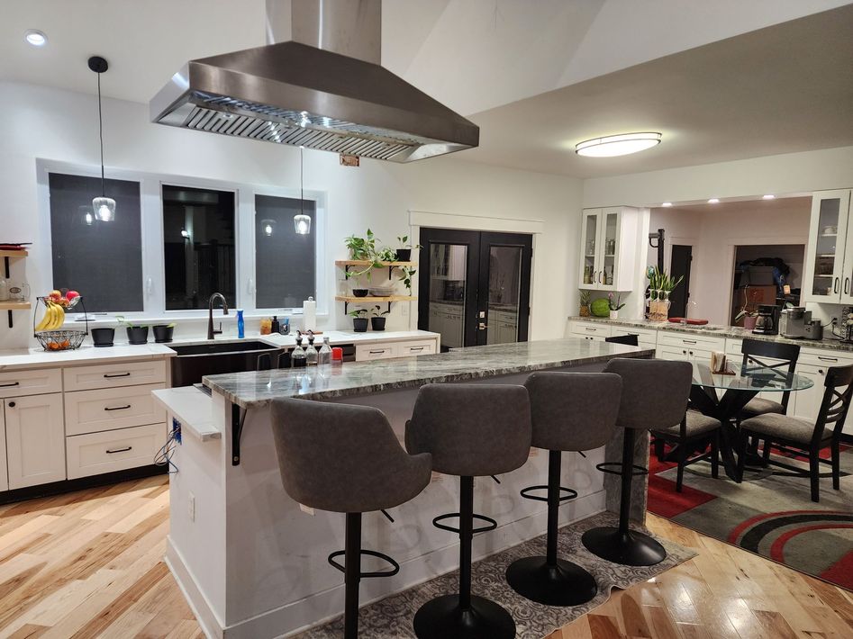 Kitchen with Large Island and Stools — Newark, DE — Oakes Signature Homes