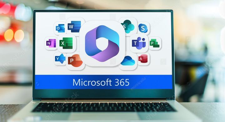 A laptop screen displays the Microsoft 365 logo surrounded by various app icons, including Word, Excel, and Teams.